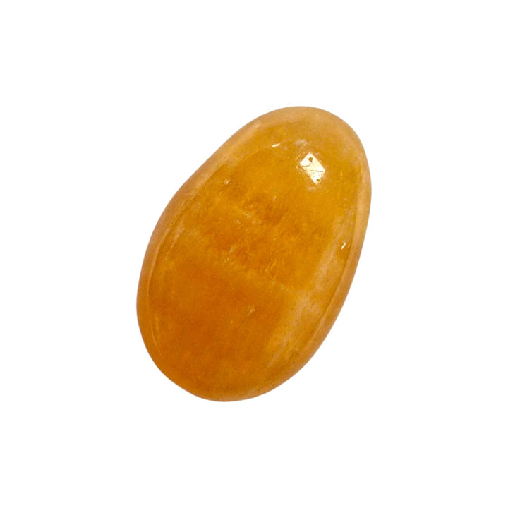 GeoFossils polished Orange Calcite with drill hole, ideal for pendant use or pocket stone