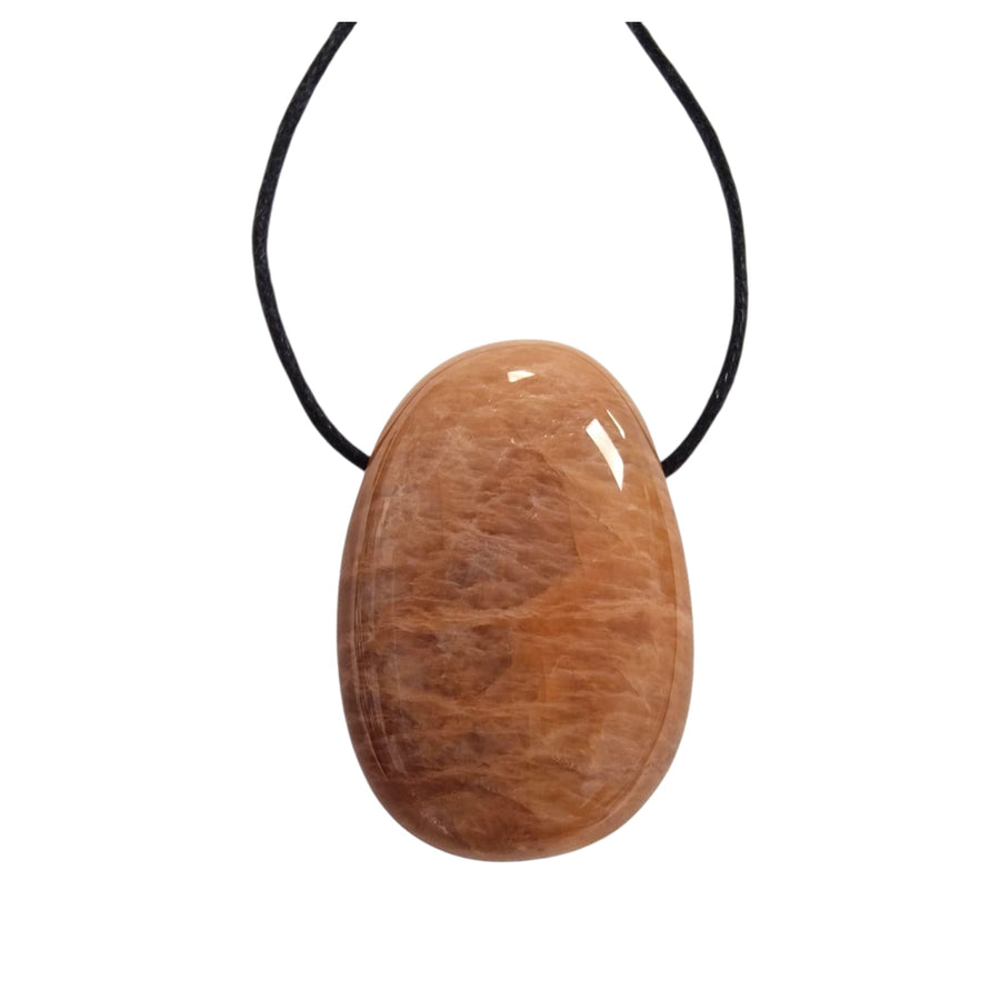 GeoFossils Peach Moonstone drilled tumble stone with soft peach shimmer and natural curves supplied with black cotton cord

