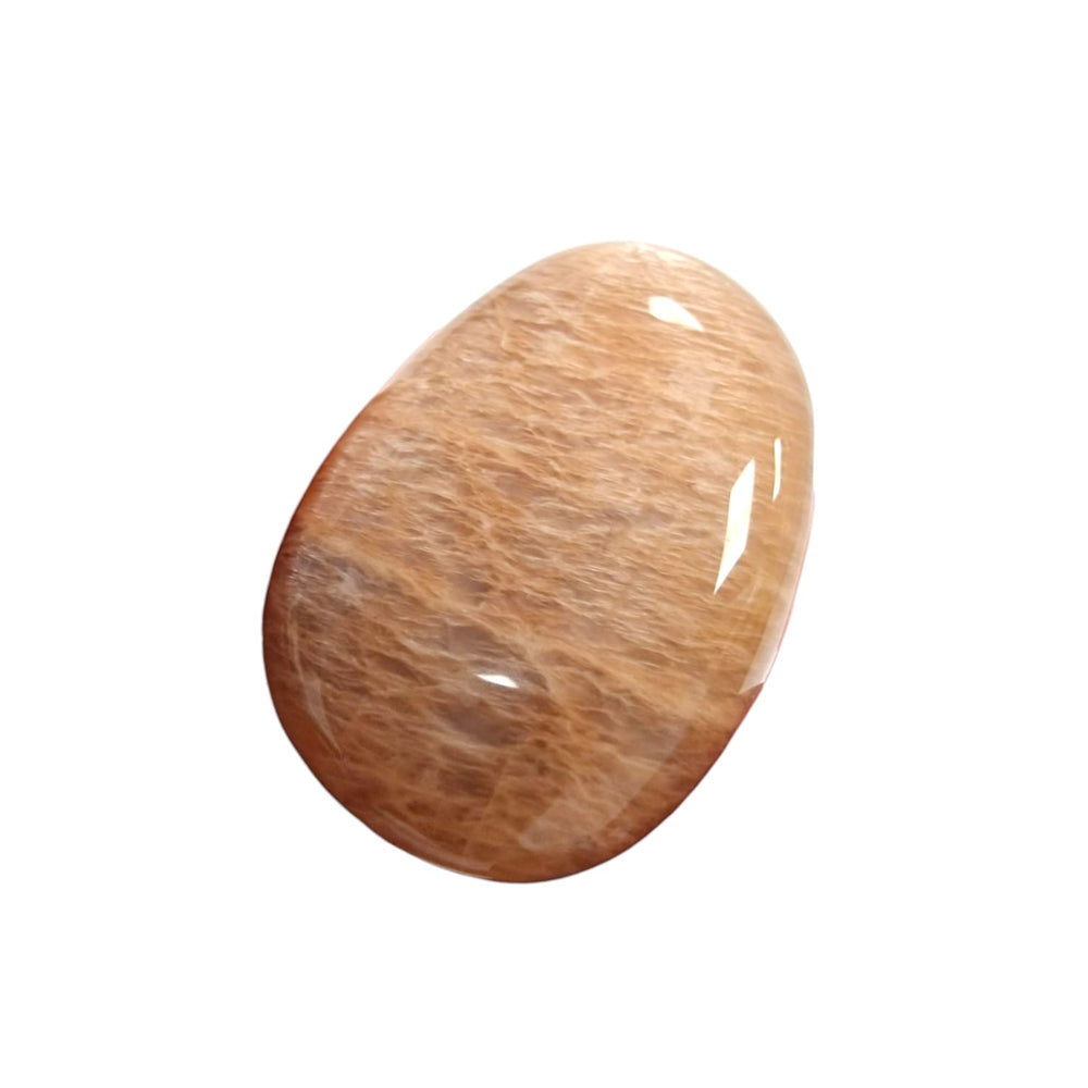 GeoFossils Peach Moonstone drilled tumble stone with soft peach shimmer and natural curves