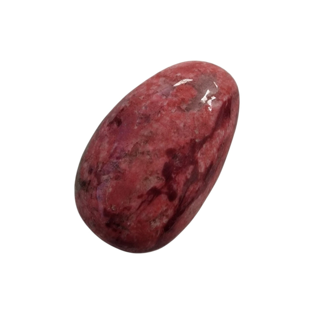 Polished Pink Thulite drilled tumble stone featuring natural raspberry tones and visible quartz flecks.