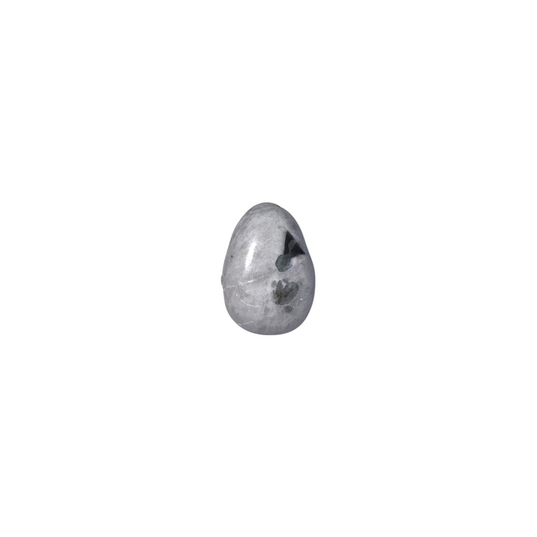 Polished Rainbow Moonstone drilled tumble stone featuring iridescent blue flash within a creamy white and translucent matrix