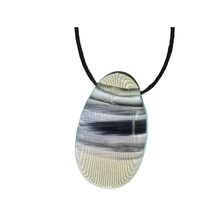 Side-drilled Midnight Lace Obsidian tumble stone shown on black vegan cotton cord. This rare obsidian features lace-like banding and offers deep aura protection, energy grounding, and support during emotional transitions.