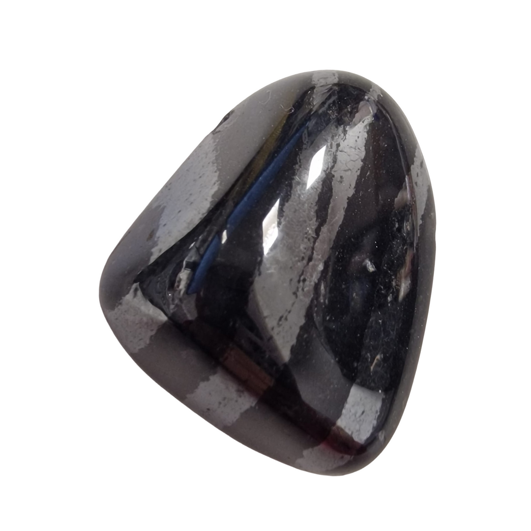 Eisenkiesel gemstone with side drill hole, blending quartz clarity with iron oxide inclusions. This rare form of quartz supports motivation, grounding, and energetic strength. Ideal for intentional jewellery or altar use.