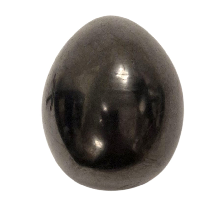 Close-up of 60mm Shungite egg showing polished reflective surface