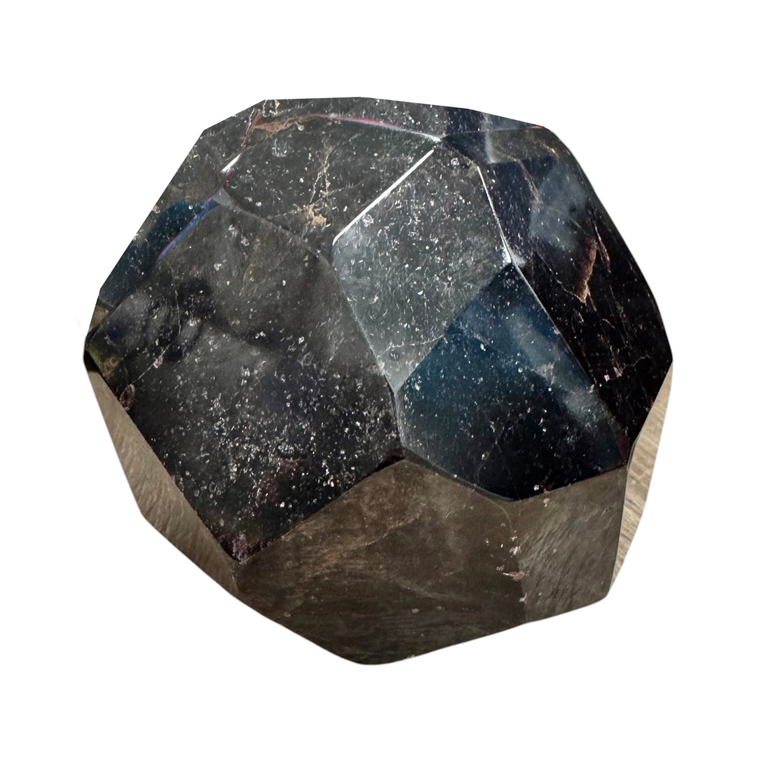 Faceted Garnet crystal sculpture from India with deep red polished surfaces
