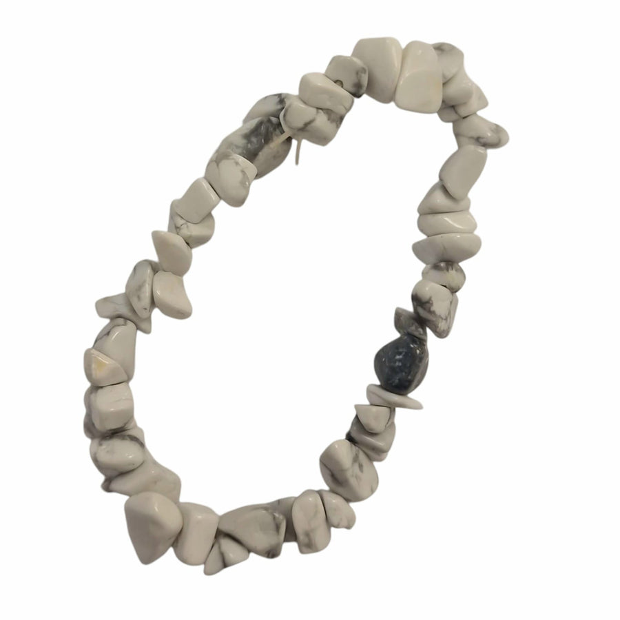 GeoFossils: Howlite Gem Chip Bracelet with white and grey marbled crystal chips on elastic cord – calming and peaceful crystal bracelet for mindfulness and stress relief