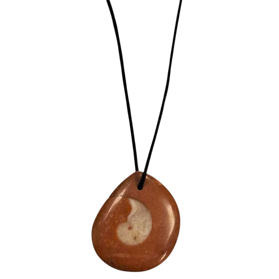 Goniatite drilled tumble stone pendant on a black cord – spiral fossil crystal for grounding, transformation and ancient spiritual energy