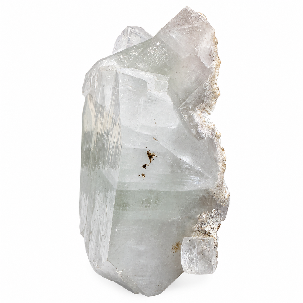 Side profile of Green Apophyllite from Pashan Quarries, India, showcasing elongated crystal faces, natural striations and delicate green colouring.