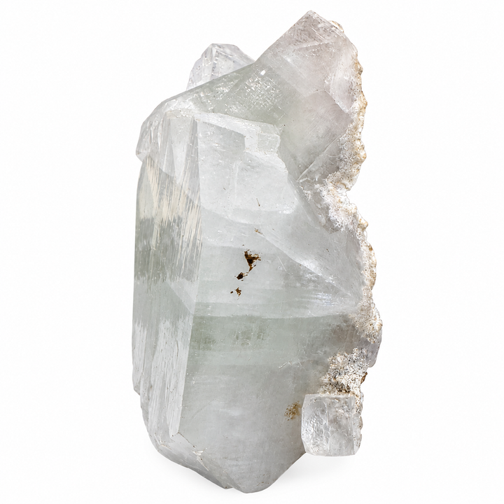 Side profile of Green Apophyllite from Pashan Quarries, India, showcasing elongated crystal faces, natural striations and delicate green colouring.