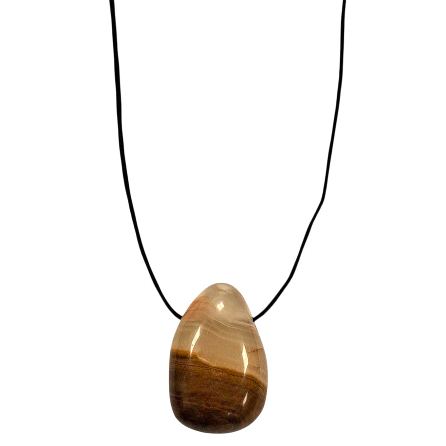 Green Onyx drilled tumble stone pendant on a black cord – calming green crystal for confidence, healing and emotional balance