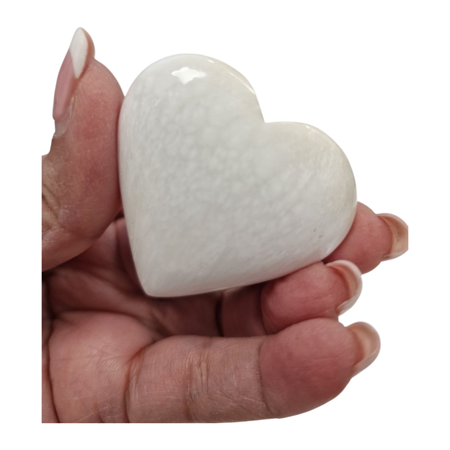 GeoFossils Scolecite Heart (Small) – a soft white zeolite heart crystal for emotional peace, love, and spiritual connection.