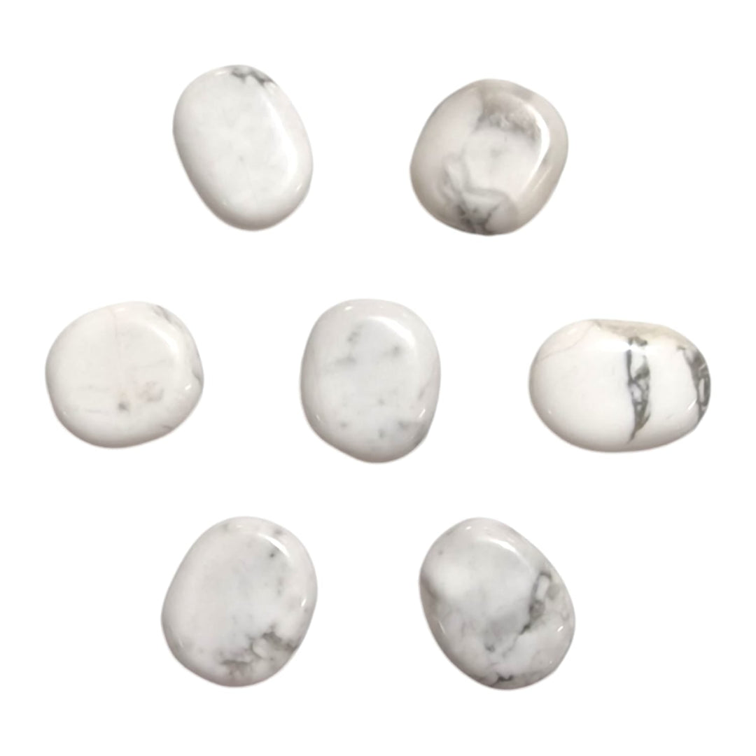 Howlite Mini Oval – a smooth white crystal with grey veins, known for promoting calm, emotional balance, and mental clarity. Ideal for stress relief and relaxation.