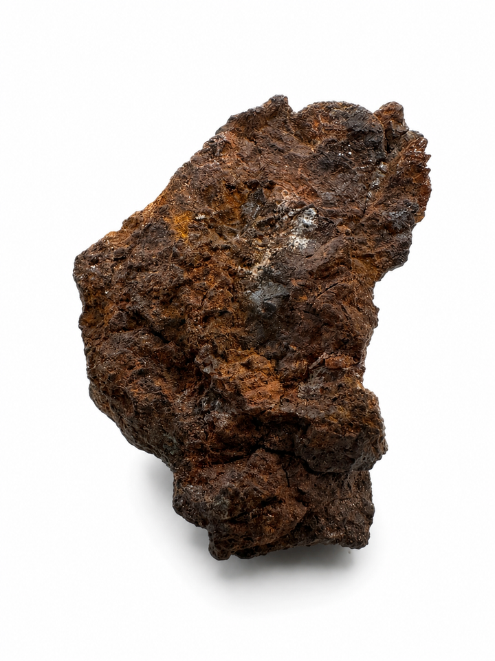 Natural Sericho stony-iron meteorite displaying its weathered exterior and fusion characteristics.