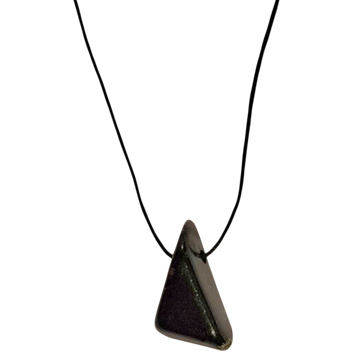 Kimberlite drilled tumble stone pendant on a black cord – deep grounding crystal for strength, transformation and ancestral healing