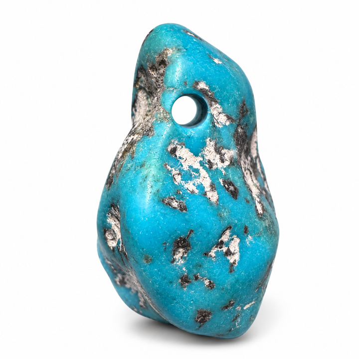 GeoFossils close-up of Kingman Mine Turquoise drilled tumblestone, highlighting the drilled hole, rounded edges and natural dark and pale matrix markings.