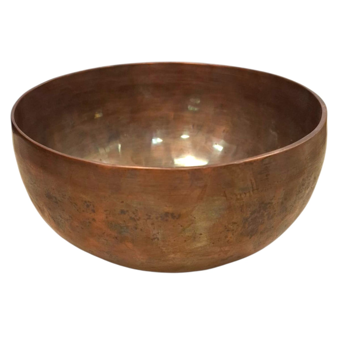 Hand-hammered metal singing bowl with striker and cushion, ideal for sound healing, meditation, and ritual energy work