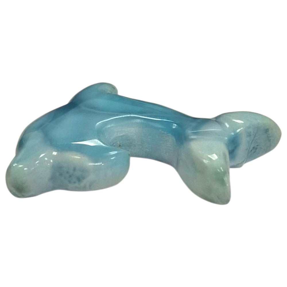 Larimar dolphin carving symbolising joy and calm ocean energy