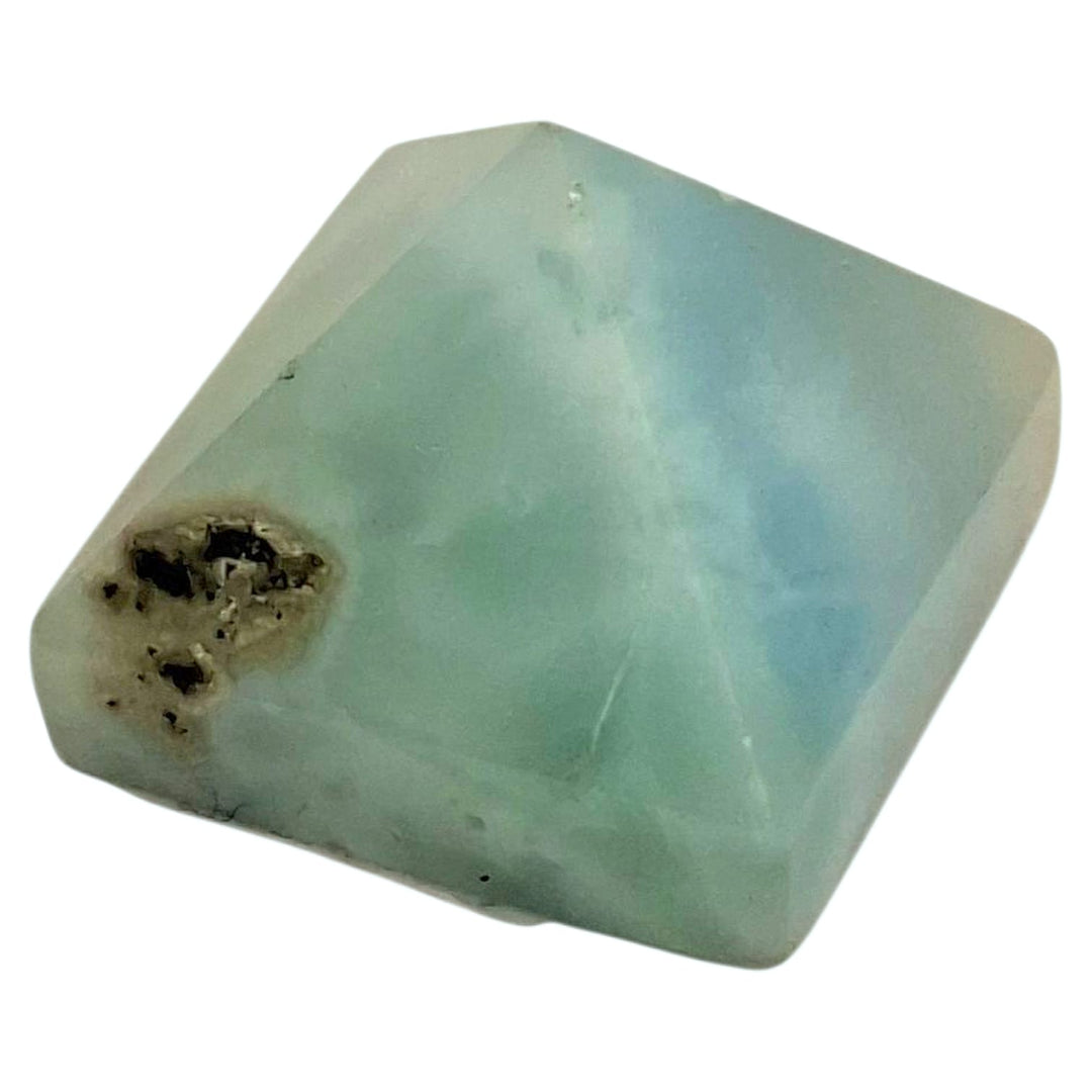 Larimar pyramid with polished blue surface and white marbling – spiritual energy tool