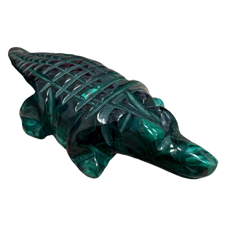 Natural polished Malachite crocodile carving with detailed mineral patterns
