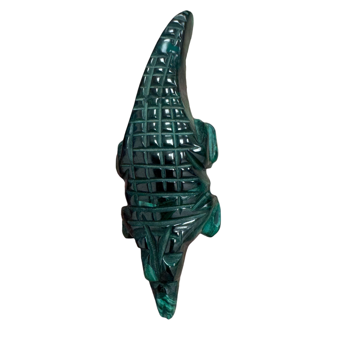 Collector-grade Congo Malachite animal carving with rich green coloration
