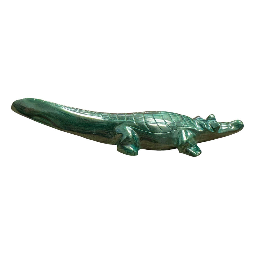 Collector-grade Congo Malachite animal carving with vivid green patterns
