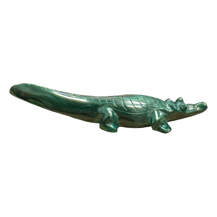 Collector-grade Congo Malachite animal carving with vivid green patterns

