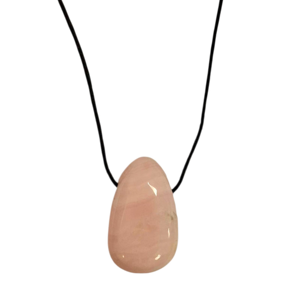 Mangano Calcite drilled tumble stone pendant on a black cord – soft pink crystal for emotional healing, love and gentle peace