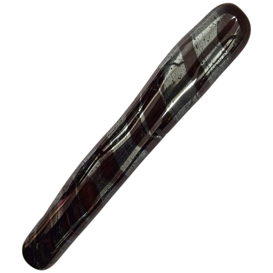 Ergonomically shaped Ancestralite massage wand with a shimmering metallic surface, ideal for grounding and body relaxation rituals.