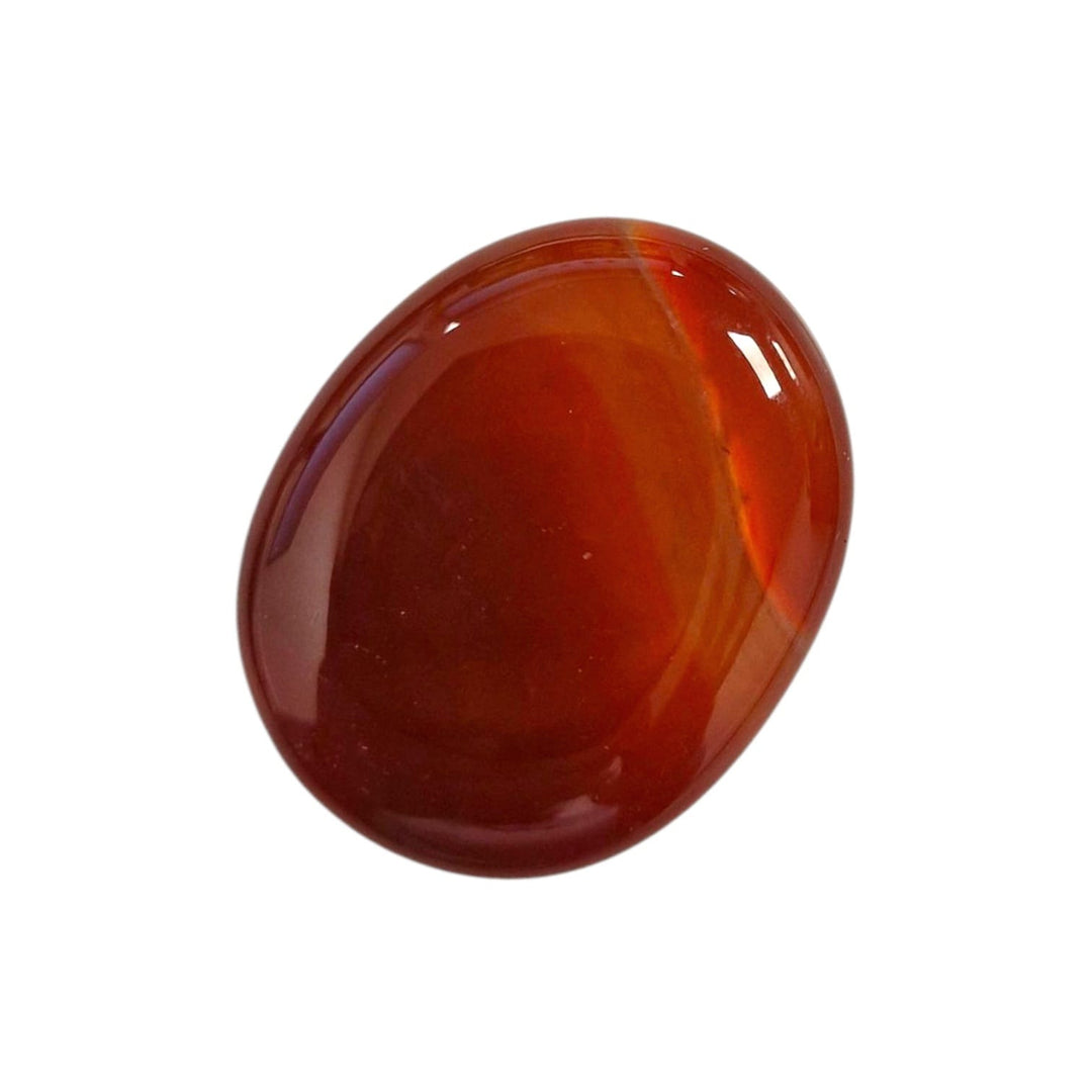 GeoFossils Carnelian Medium Oval, a warm orange-red crystal for vitality, confidence, and creative energy.
