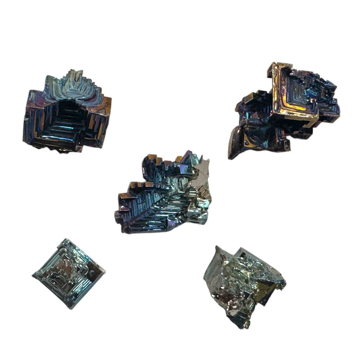 Group of small iridescent Bismuth crystals showing rainbow metallic colours.