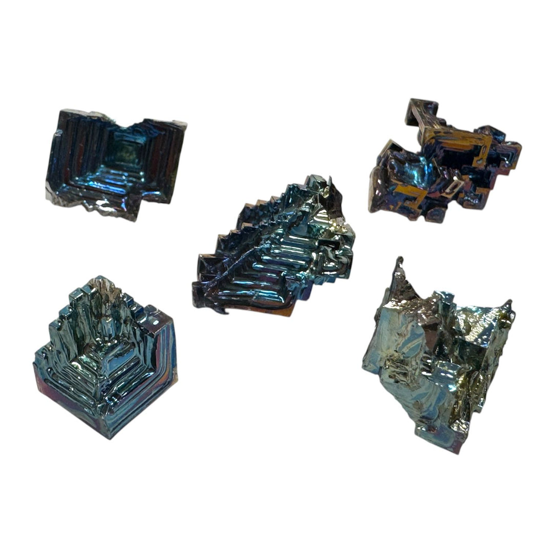 Group of small iridescent Bismuth crystals showing rainbow metallic colours.