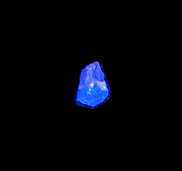 Raw Diamond UV Reactive Mineral with vivid under-UV glow