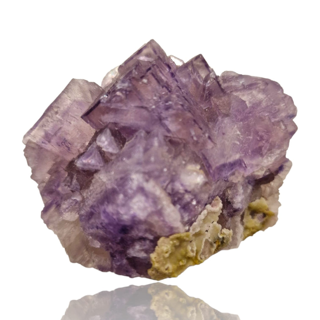 GeoFossils Fluorite with Smithsonite Mineral Specimen – UV reactive crystal showing translucent fluorite with delicate smithsonite formations.