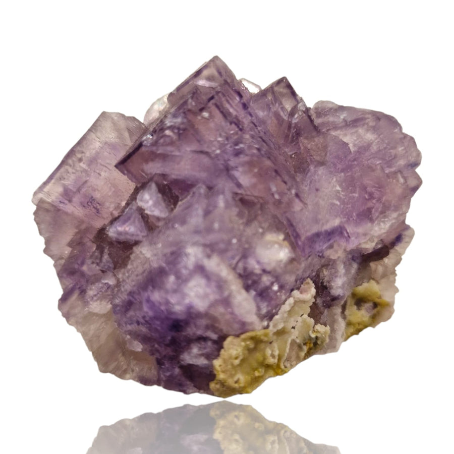 GeoFossils Fluorite with Smithsonite Mineral Specimen – UV reactive crystal showing translucent fluorite with delicate smithsonite formations.