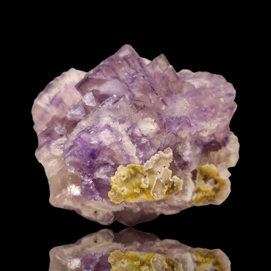 GeoFossils Fluorite with Smithsonite Mineral Specimen – UV reactive crystal showing translucent fluorite with delicate smithsonite formations.