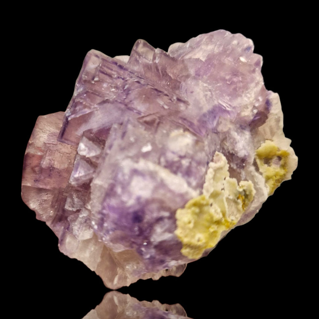 GeoFossils Fluorite with Smithsonite Mineral Specimen – UV reactive crystal showing translucent fluorite with delicate smithsonite formations.