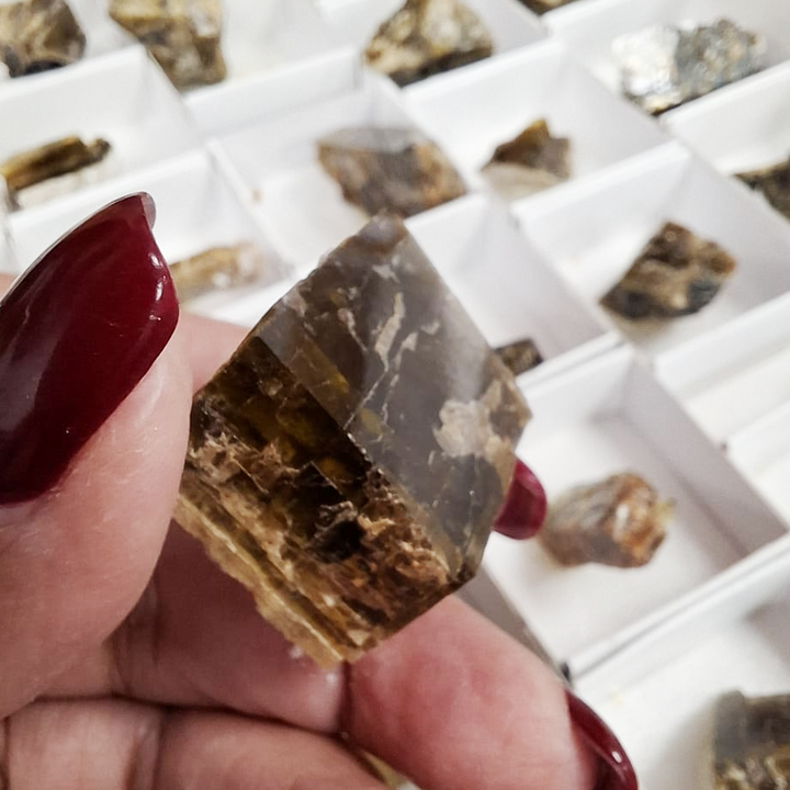 Close-up of siderite crystal from Panasqueira displaying sharp rhombohedral structure and lustre.