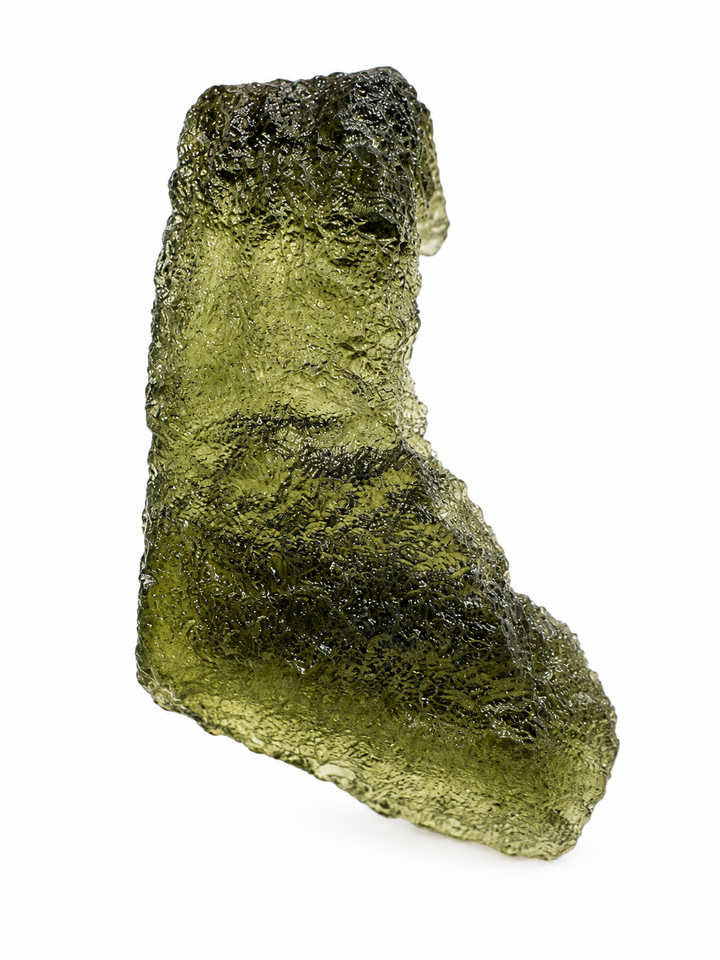 Genuine Moldavite specimen shown on hand for scale.