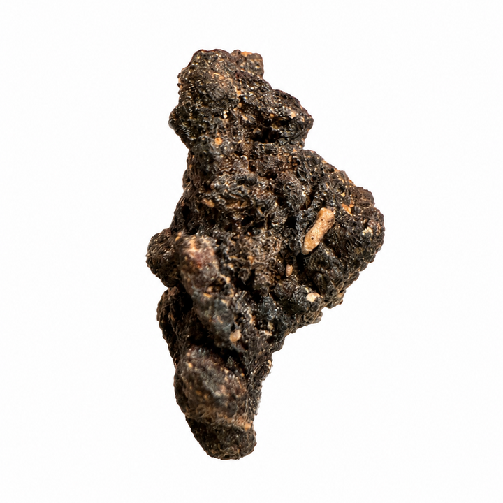 Natural Monturaqui Impactite from Chile photographed on a white background, featuring a rugged impact melt surface with mineral inclusions.