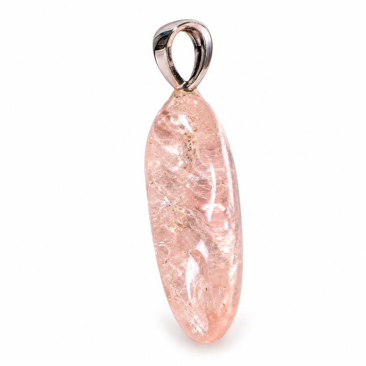 GeoFossils Morganite Tumblestone Pendant photographed from the side, highlighting the gemstone's polished rounded edges, natural thickness, pale pink colouring and sterling silver bail.