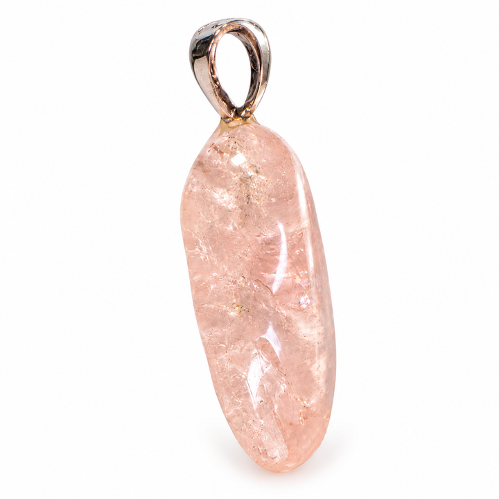 GeoFossils Morganite Tumblestone Pendant showing an alternative side angle, revealing the smooth polished surface, translucent pink tones, natural inclusions and silver bail.