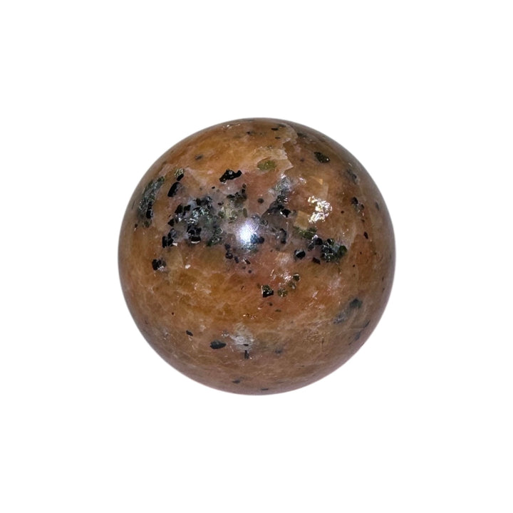 GeoFossils Orange Calcite Sphere with Green & Black Tourmaline Inclusions – Madagascan crystal sphere for creativity, heart healing, grounding, and energy protection.