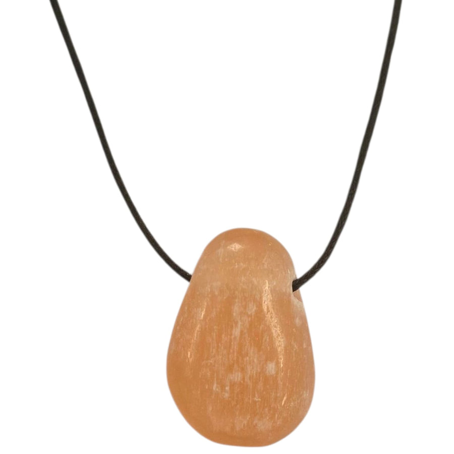 GeoFossils Orange Selenite Drilled Tumble Stone – peachy-orange crystal with horizontal drill hole for cleansing, grounding and emotional vitality