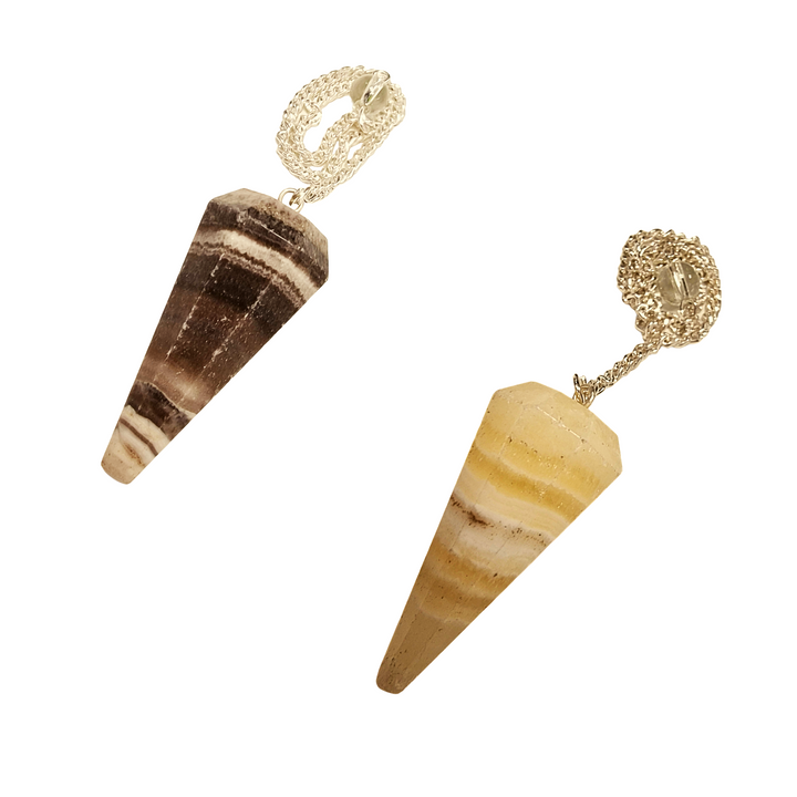Showing a Combination Zebra Calcite pendulum with striped natural pattern and silver chain
