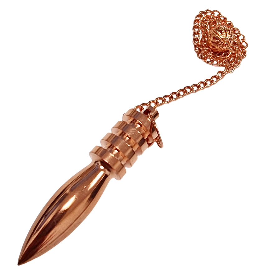 Copper bullet shaped pendulum with silver-toned chain on light background