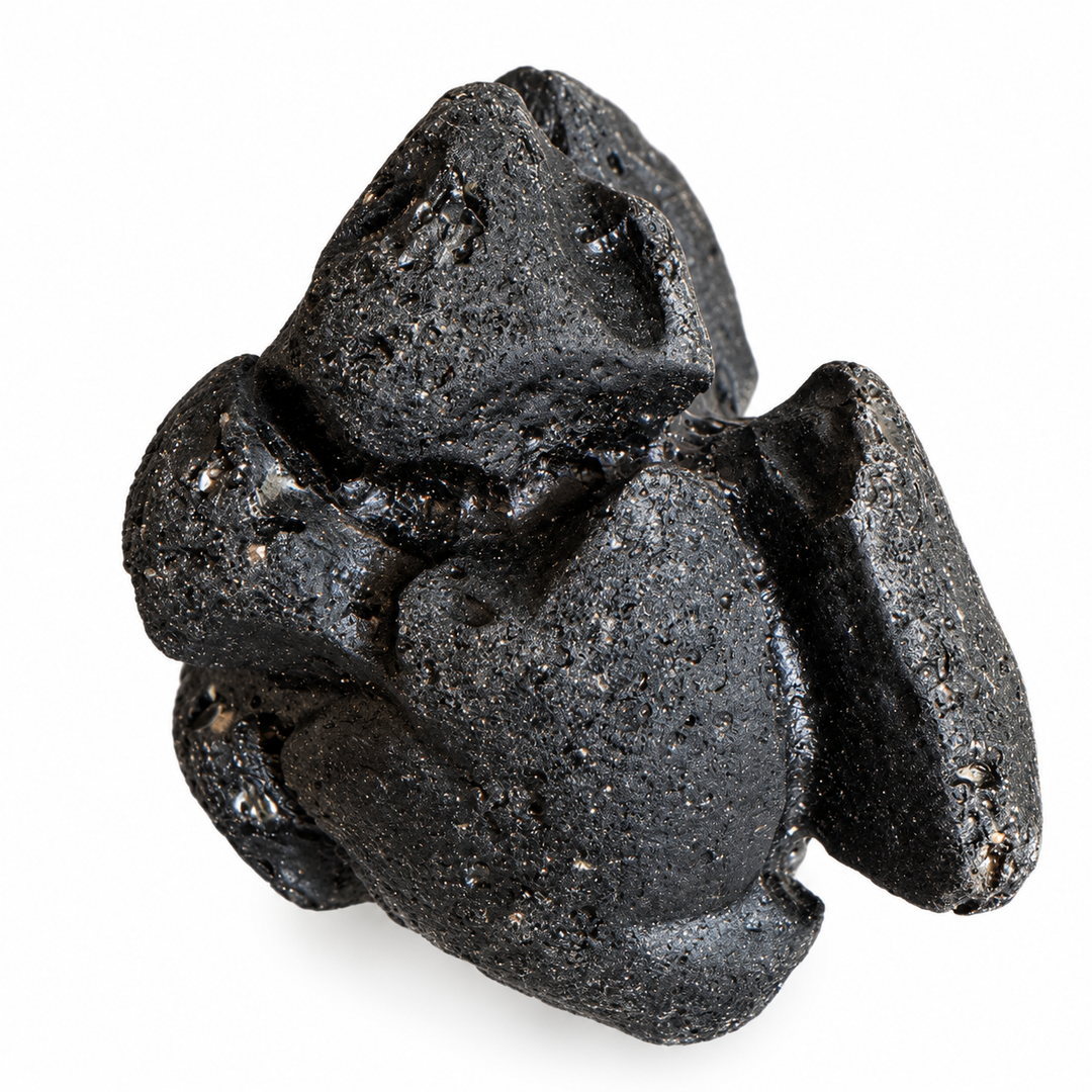 GeoFossils irregular Philippine tektite specimen with rounded lobes and porous surface texture on a white background.