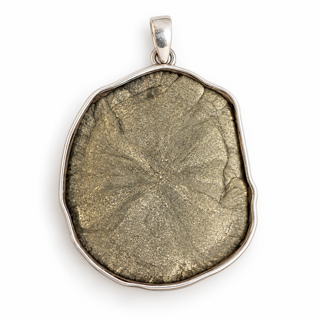 Reverse of a natural Pyrite Sun pendant showing its fine crystalline texture, rounded organic shape and polished sterling silver setting.