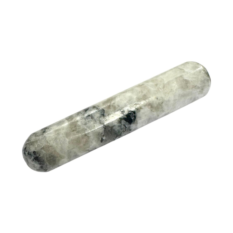 Polished Rainbow Moonstone crystal massage wand with a milky white base and flashes of iridescent blue, smooth cylindrical form with rounded ends, ideal for soothing massage, feminine energy work, and enhancing intuition