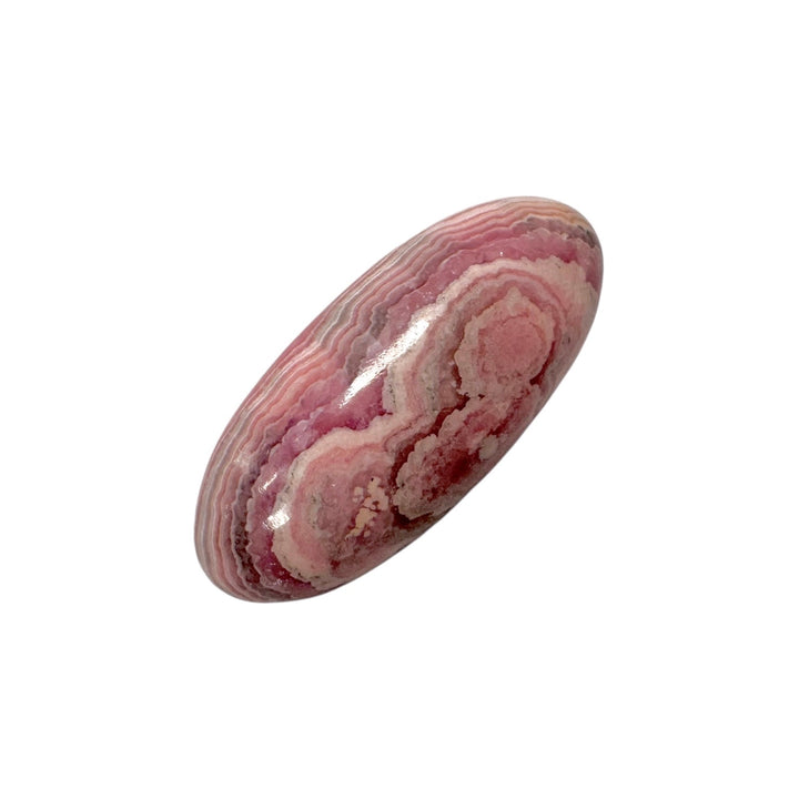 GeoFossils Rhodochrosite Shiva Lingham 35mm – intuitively picked, polished pink crystal for love, compassion, and emotional healing.