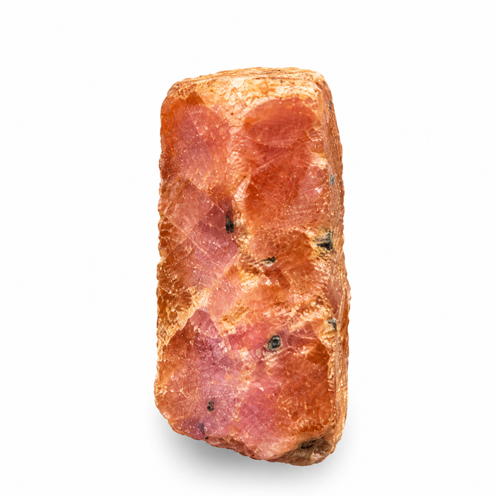 GeoFossils Ruby mineral specimen 208 showing its natural pink and reddish tones with a rough crystal surface on a white background.